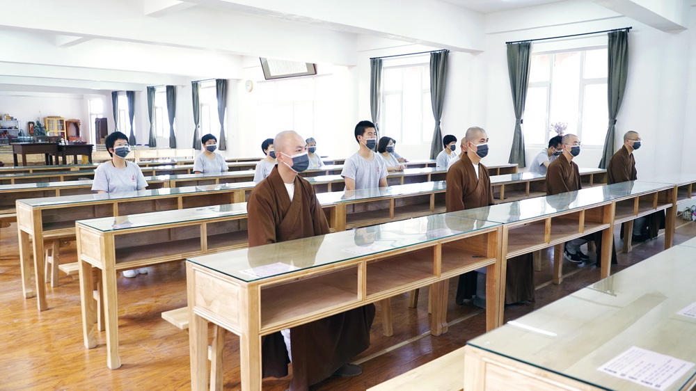 恢复开放升国旗  普法宣传进寺院